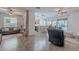 Inviting living space showcasing the kitchen, dining area, and living room, perfect for Gathering gatherings and entertaining at 42711 N 43Rd Dr, New River, AZ 85087