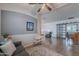 An open-concept living space showcasing stylish decor, comfortable seating, and seamless flow between living areas at 42711 N 43Rd Dr, New River, AZ 85087