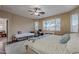 Large bedroom with natural light and space for a desk at 42711 N 43Rd Dr, New River, AZ 85087