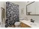 Bathroom featuring a white vanity, and a floral shower curtain at 4325 E Vallejo Ct, Gilbert, AZ 85298