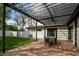 Relax on this covered brick patio, complete with outdoor seating and a well-manicured lawn at 4331 E Avalon Dr, Phoenix, AZ 85018