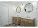Elegant bathroom with dual vanities, marble countertops, and stylish fixtures at 4331 E Avalon Dr, Phoenix, AZ 85018