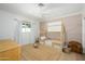 Cozy bedroom featuring charming decor, a unique bed frame, and natural light at 4331 E Avalon Dr, Phoenix, AZ 85018