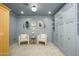 Cozy bedroom featuring stylish decor, comfortable seating, and built-in storage at 4331 E Avalon Dr, Phoenix, AZ 85018