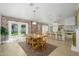 Charming dining area featuring exposed brick and a view of the yard at 4331 E Avalon Dr, Phoenix, AZ 85018