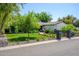 Charming home on a sunny lot with lush, mature landscaping and a fence at 4331 E Avalon Dr, Phoenix, AZ 85018