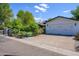 Detached two-car garage on a sunny lot with mature landscaping at 4331 E Avalon Dr, Phoenix, AZ 85018