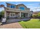 Well manicured backyard featuring a covered patio, large sliding doors and outdoor living at 4412 E Grand Canyon Dr, Chandler, AZ 85249