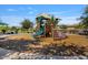 Colorful playground with slides and climbing structures in a well-maintained community area at 4412 E Grand Canyon Dr, Chandler, AZ 85249