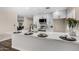 Modern kitchen featuring stainless steel appliances, marble countertops, and white cabinetry at 5022 E Magic Stone Dr, Phoenix, AZ 85044