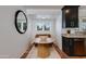 Charming kitchen nook with a cozy seating area, bright window, and stylish round table for casual dining at 5110 E Verde Ln, Phoenix, AZ 85018