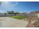 Expansive backyard featuring artificial turf and hardscape at 5800 W Kesler St, Chandler, AZ 85226