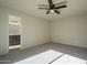 Bedroom with new carpet, ceiling fan, and an en suite bathroom at 5800 W Kesler St, Chandler, AZ 85226