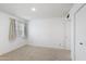 Simple bedroom with carpet, a window with blinds, and a closet at 6105 N 12Th Way, Phoenix, AZ 85014