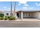 Charming single-story home with a carport and desert landscaping at 6105 N 12Th Way, Phoenix, AZ 85014