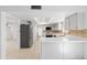 Modern kitchen featuring light cabinets and stone countertops at 6105 N 12Th Way, Phoenix, AZ 85014