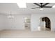 Bright living space with modern lighting seamlessly integrates with the stylish kitchen area at 6105 N 12Th Way, Phoenix, AZ 85014