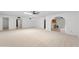 Open living area with tile floors and views of the adjacent kitchen at 6105 N 12Th Way, Phoenix, AZ 85014