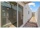Covered patio with sliding glass doors and white stucco exterior at 6105 N 12Th Way, Phoenix, AZ 85014