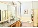 Bright bathroom features a large mirror, bathtub, and glass enclosed shower at 7024 W Tether Trl, Peoria, AZ 85383