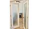 Open doorway with tiled floor and frosted glass paneled doors at 7024 W Tether Trl, Peoria, AZ 85383