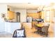 Bright and airy kitchen with an eat-in area and stainless steel appliances at 7024 W Tether Trl, Peoria, AZ 85383