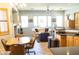 Bright and airy living room with large windows and comfortable seating at 7024 W Tether Trl, Peoria, AZ 85383