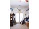 Music room with various instruments, including guitars and drums at 7024 W Tether Trl, Peoria, AZ 85383