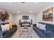 Comfortable living room with modern decor, two sofas, and a stylish glass coffee table at 7526 E Mckinley St, Scottsdale, AZ 85257