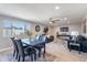 Inviting living room with neutral tones, modern furnishings, and lots of natural light at 7526 E Mckinley St, Scottsdale, AZ 85257