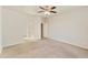 Spacious bedroom with neutral carpet and ensuite bathroom at 770 W Kent Pl, Chandler, AZ 85225