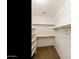 Spacious walk-in closet with custom shelving and ample storage space at 770 W Kent Pl, Chandler, AZ 85225