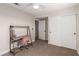 Bedroom with large closet, neutral paint, neutral carpet and ceiling fan at 8807 E Dahlia Dr, Scottsdale, AZ 85260