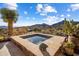 Spa hot tub surrounded by desert plants at 9920 E Honey Mesquite Dr # 155, Scottsdale, AZ 85262