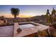 Inviting outdoor hot tub overlooks the scenic desert landscape at sunset at 9920 E Honey Mesquite Dr # 155, Scottsdale, AZ 85262