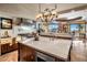 Spacious kitchen boasts stainless steel appliances, large island, and stunning mountain views at 9920 E Honey Mesquite Dr # 155, Scottsdale, AZ 85262