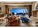 Cozy living room showcasing a beautiful sunset view and sophisticated decor at 9920 E Honey Mesquite Dr # 155, Scottsdale, AZ 85262