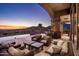 Inviting outdoor patio with ample seating overlooking the pool and captivating mountain views at 9920 E Honey Mesquite Dr # 155, Scottsdale, AZ 85262