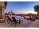 Scenic outdoor pool and lounge chairs with breathtaking desert views at dusk at 9920 E Honey Mesquite Dr # 155, Scottsdale, AZ 85262