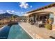 Stunning backyard pool with outdoor seating area and picturesque mountain views at 9920 E Honey Mesquite Dr # 155, Scottsdale, AZ 85262