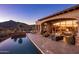 Backyard pool with a covered patio and stunning desert landscape in the distance at 9920 E Honey Mesquite Dr # 155, Scottsdale, AZ 85262