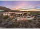 Beautiful desert home with a red tile roof features a pool, spa, and covered patio with breathtaking mountain views at 9920 E Honey Mesquite Dr # 155, Scottsdale, AZ 85262