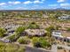 Expansive aerial view capturing the property's location, surrounding landscape, and nearby amenities at 10290 N 117Th Pl, Scottsdale, AZ 85259