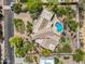 Bird's-eye view of property, highlighting pool, manicured landscaping, and roof design at 10290 N 117Th Pl, Scottsdale, AZ 85259
