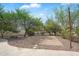 A versatile backyard space showcasing a spacious patio area with beautiful desert landscaping at 10290 N 117Th Pl, Scottsdale, AZ 85259