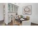 Bright dining area featuring a round table, built-in cabinets, and a stylish decor that compliments the space at 10290 N 117Th Pl, Scottsdale, AZ 85259