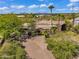 Stunning home featuring mature landscaping, a fountain, and charming curb appeal at 10290 N 117Th Pl, Scottsdale, AZ 85259