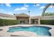 Backyard pool and landscaping with mature trees creating a relaxing outdoor oasis at 10290 N 117Th Pl, Scottsdale, AZ 85259