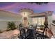 Inviting outdoor patio area with comfortable seating, perfect for relaxing and entertaining at 12860 W Junipero Dr, Sun City West, AZ 85375