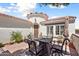Inviting outdoor patio area with comfortable seating, perfect for relaxing and entertaining at 12860 W Junipero Dr, Sun City West, AZ 85375